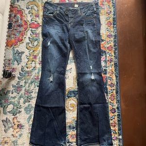 Silver, Size 30 Wide Leg Jeans. Heavy wear on back of jean hem, pictured
